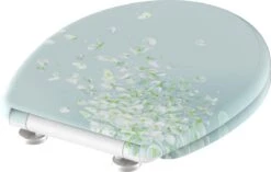 SCHÜTTE WC-Bril 82381 FLOWER IN THE WIND - Duroplast - Soft Close - Afklikbaar - RVS-Scharnieren - Decor - 3-zijdige Print -Badkamer Kast Winkel 1200x762 2